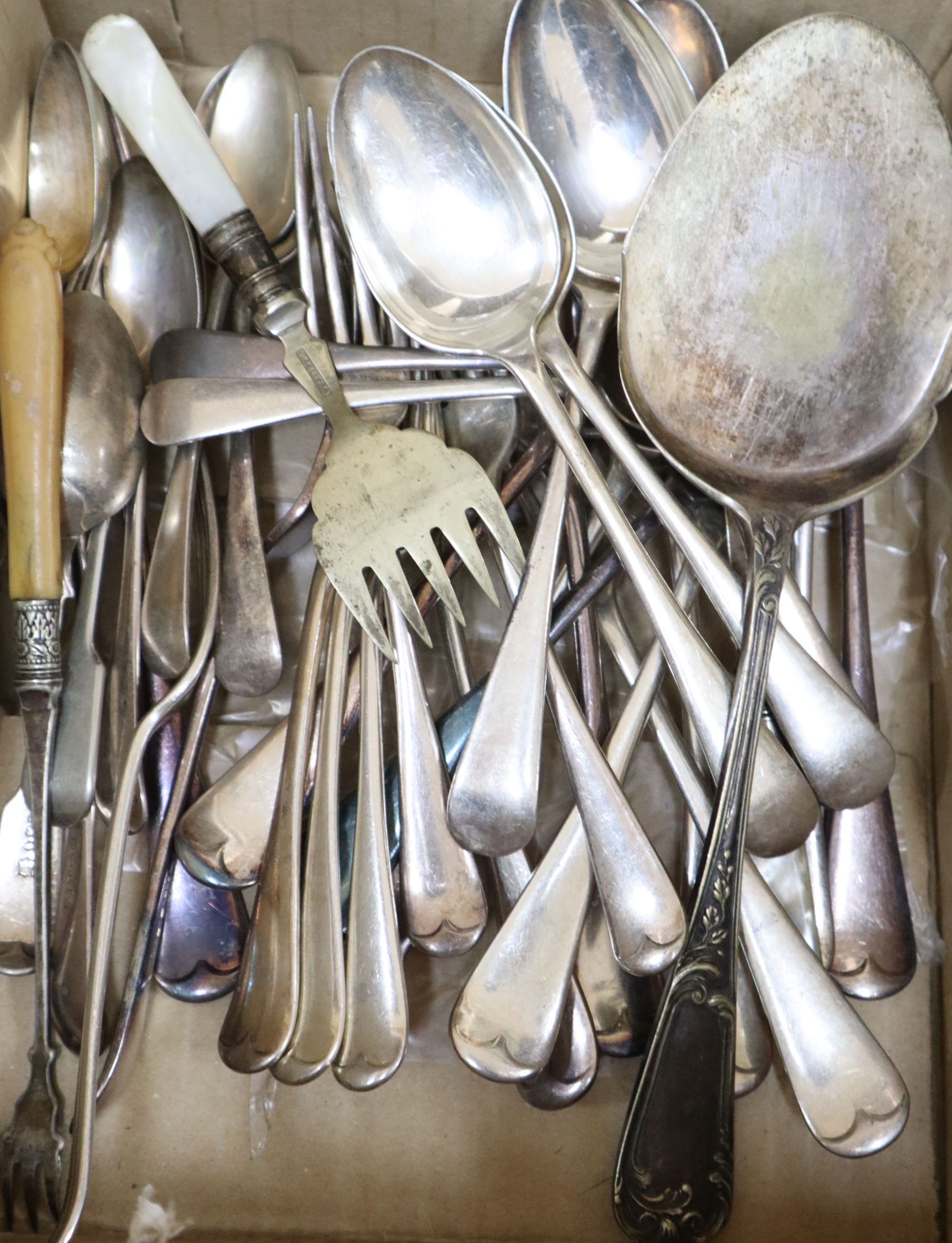 A collection of silver plated flatware, servers etc.